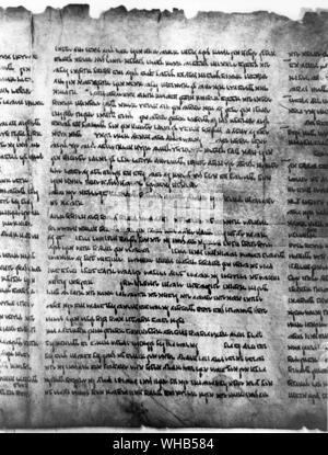 A page from the Isiah Scroll of the Dead Sea Scrolls. Found near Wadi Qumran. Discovered in 1947 - The Dead Sea Scrolls comprise roughly 900 documents, including texts from the Hebrew Bible, discovered between 1947 and 1956 in eleven caves in and around the Wadi Qumran (near the ruins of the ancient settlement of Khirbet Qumran, on the northwest shore of the Dead Sea) in the West Bank. The texts are of great religious and historical significance, as they include practically the only known surviving copies of Biblical documents made before 100 AD, and preserve evidence of considerable Stock Photo
