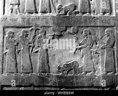 Detail from black obelisk of Shalmaneser III. Jehu bows to the Assyrian king Stock Photo