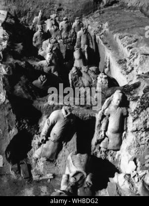 The tomb of Chin Shih Huang , the First Emperor of China . Detailed picture of a corridor in the first pit , at the earliest stage of excavation . The soliders are unarmoured spearmen . Stock Photo