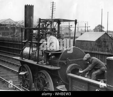 Stephenson's locomotive No. 1 - centenary celebrations - Locomotion No. 1, although more than once rebuilt, retains its original appearance. Its wheels, however, are of a pattern introduced by Timothy Hackworth. The engine was built to the specifications of George Stephenson at the Forth Street Works, Newcastle, founded by him and his son. It opened the World's first locomotive-worked public railway on September 27th 1825 when it was driven by George Stephenson himself.. Stock Photo