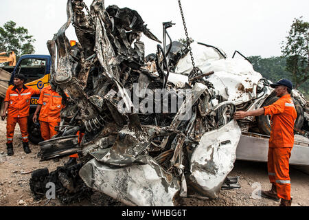 West Java, Indonesia. 2nd Sep, 2019. Officers move the wreckage of vehicles from scene after a toll road accident in Cipularang, West Java, Indonesia, Sept. 2, 2019. Six people were killed and dozens were injured in a multiple-vehicle collision involving cars, trucks and buses on a toll road in Cipularang, a police officer said. Credit: Reza Estily/Xinhua Credit: Xinhua/Alamy Live News Stock Photo