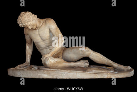 Dying Gaul, statue in Capitoline Museums, Rome, Italy. Ancient Roman marble copy of a lost Hellenistic sculpture. Isolated on black. Stock Photo