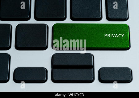 Privacy on laptop keyboard.  Isolated text on theme of internet security. Stock Photo