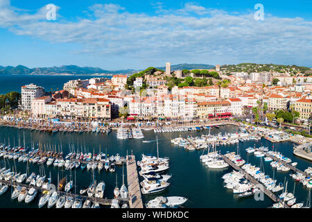 Cannes port aerial panoramic view. Cannes is a city located on the French Riviera or Cote d'Azur in France. Stock Photo
