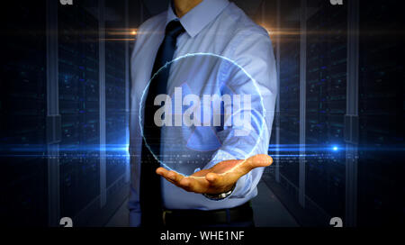 Man with dynamic nuclear energy symbol hologram on hand. Businessman and futuristic concept of science, danger icon and warning with light and glitch Stock Photo