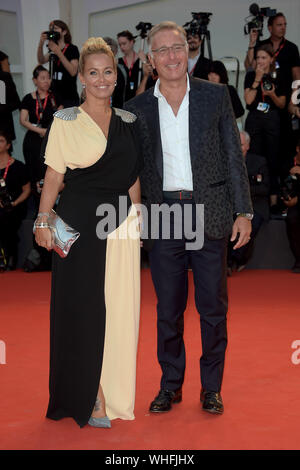 Venice, Italy. 02nd Sep, 2019. 76th Venice Film Festival 2019, Red Carpet film ‚ÄòMartin Eden‚Äô. Pictured: Sonia Bruganelli, Paolo Bonolis Credit: Independent Photo Agency/Alamy Live News Stock Photo