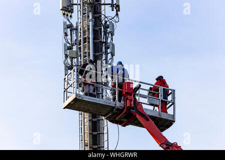 Radio mast, mobile radio, telephone, will be upgraded, equipped with new antennas. Germany Stock Photo