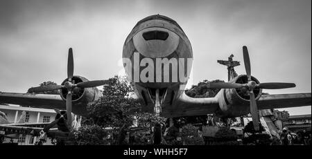 Crashed military propeller aircraft of US air force as symbol for victory in American War at war museum in Hanoi, Vietnam Stock Photo