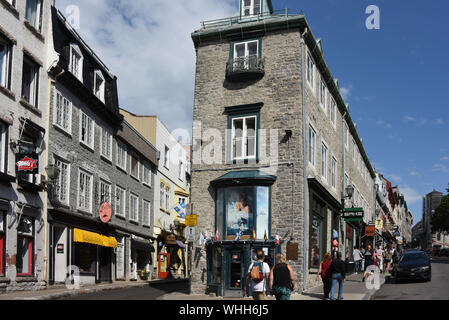 Quebec City, Canada - April, 12, 2019: Historic buildings on Rue Garneau and Côte de la Fabrique in old Quebec City, a UNESCO Hertiage site. Stock Photo