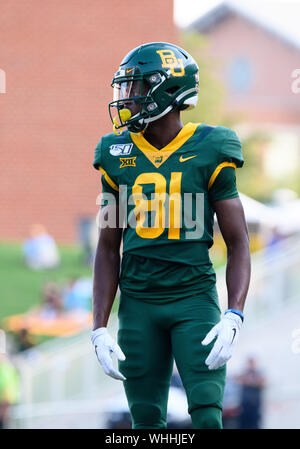 Baylor wide receiver Tyquan Thornton (81) gets past Kansas safety Bryce ...