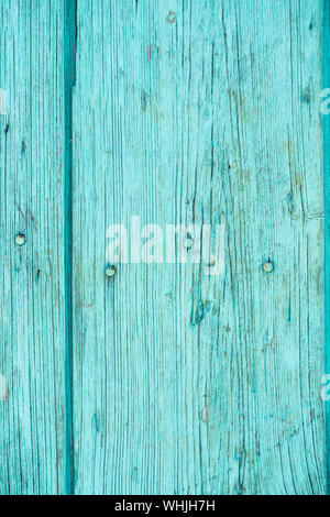 Weathered turquoise wooden plank with nails Stock Photo