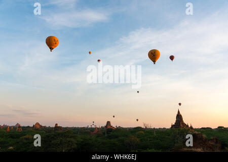 BAGAN, MYANMAR - 06 DECEMBER, 2018: Horizontal picture of hot air balloons over the old temples in Bagan, Myanmar Stock Photo