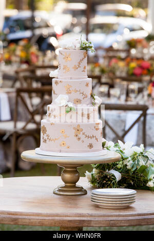 Four tier wedding cake with white roses Stock Photo