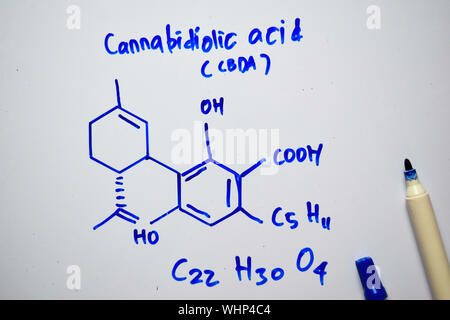 Concept of Cannabidiolic Acid (CBDA) molecule written on the white ...