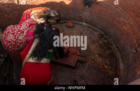Kathmandu, Nepal. 02nd Sep, 2019. Women offer prayers to the lord Shiva during the festival.Hindu women especially celebrate Teej Festival by dancing and praying. Women fast and pray for marriage and family. Single women pray for better future marriage, while married women pray for marital bliss. Credit: SOPA Images Limited/Alamy Live News Stock Photo