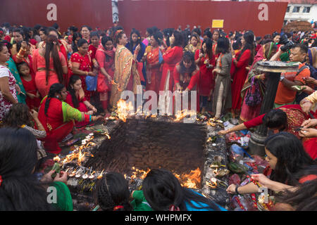 Kathmandu, Nepal. 02nd Sep, 2019. Women perform rituals during the festival.Hindu women especially celebrate Teej Festival by dancing and praying. Women fast and pray for marriage and family. Single women pray for better future marriage, while married women pray for marital bliss. Credit: SOPA Images Limited/Alamy Live News Stock Photo