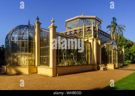 The Palm House Conservatory, a glasshouse built in 1875 and now surrounded by cacti and succulents  in Adelaide, SA, Australia Stock Photo