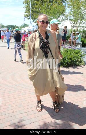 Bridgehampton, NY, USA. 1st Sep, 2019. Donna Karan at the Hampton Classic Horse Show Grand Prix in Bridgehampton, New York on September 1, 2019. Credit: Mpi98/Media Punch/Alamy Live News Stock Photo