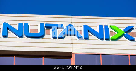 Nutanix logo and sign on facade of cloud computing software company headquarters in Silicon Valley Stock Photo