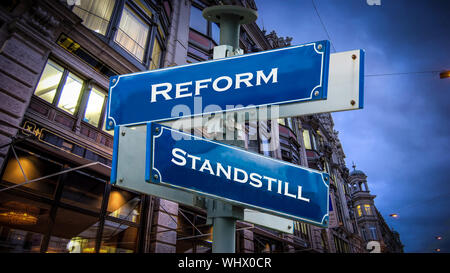 Street Sign the Direction Way to Reform versus Standstill Stock Photo