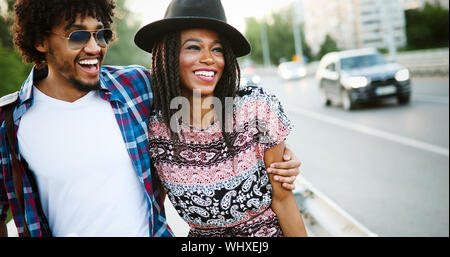Portrait of loving african american couple walking outdoor Stock Photo