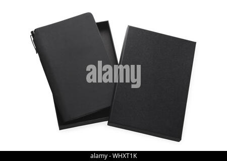 Black notebook in openen box with pen holder, mockup on grey background, business gift Stock Photo
