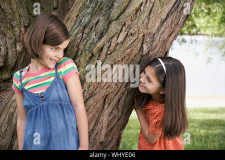 Girls playing hide and seek - Stock Image - F022/6980 - Science Photo  Library