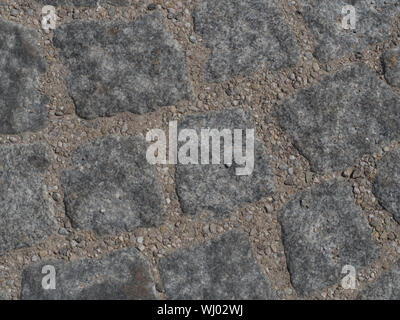 Gray cobblestones with seam of sand Stock Photo