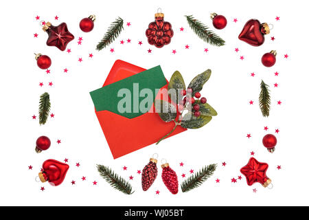 Christmas red decorations on white background. Flatlay, top view, copy space. Stock Photo