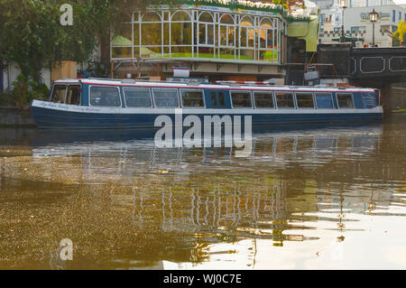 London, Uk - October 12, 2009 - A blue tour restaurant boat moored on Regent's canal in Camden Town Stock Photo