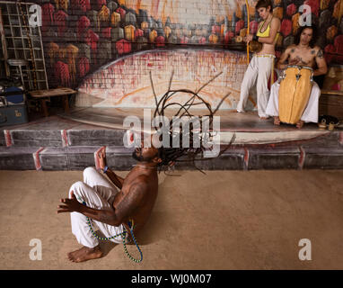 Group of capoeira performers in action and playing music Stock Photo