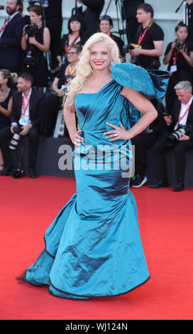 (190903) -- VENICE, Sept. 3, 2019 (Xinhua) -- Director Angela Ismailos poses on the red carpet during the 76th Venice International Film Festival in Venice, Italy, Sept. 1, 2019. Stars attend the event in high fashion costumes. (Xinhua/Cheng Tingting) Stock Photo