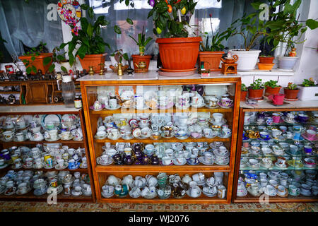 Porcelain teacups on display in Predeal is a mountain resort town in Brasov County, Romania. Stock Photo