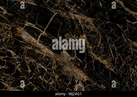 Gold and white Patterned natural of dark gray marble texture background for product design. Black marble natural pattern for background. Stock Photo