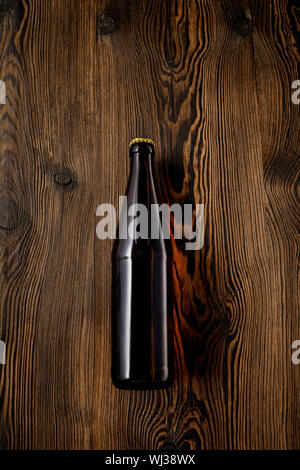 beer bottle on wooden table . Top view Stock Photo