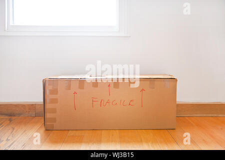 Cardboard box marked 'fragile' Stock Photo