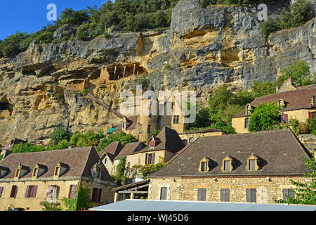 Precarious stairs to the remains of medieval fortifications at the Roque-Gageac, one of France's most beautiful villages, on the Dordogne River Stock Photo