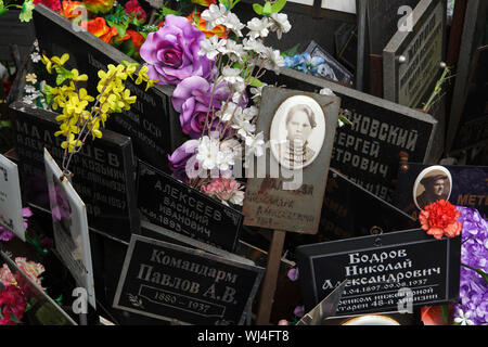 Communal grave of unclaimed ashes number one, where people executed by the NKVD were secretly buried from 1930 to 1942, at the Donskoye Cemetery in Moscow, Russia. It is believed the mass grave contains the remains of 4259 victims of Stalin's regime. The plaques with the names were installed by the relatives since the 1980s. Stock Photo