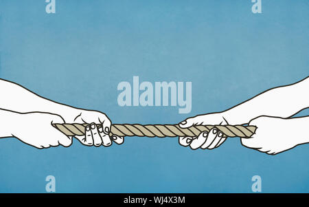 Couple playing tug-of-war with rope Stock Photo