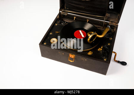 An old battered record player audio device that closes like a suitcase Stock Photo
