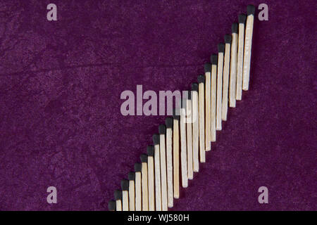 Matchsticks in shape of bar graph representing growth Stock Photo