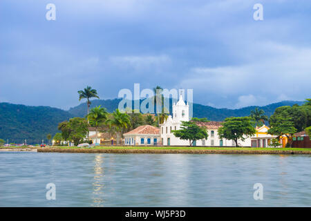 Paraty (or Parati) is a preserved Portuguese colonial (1500–1822) and Brazilian Imperial (1822–1889) town.  It is located on the Costa Verde (Green Co Stock Photo