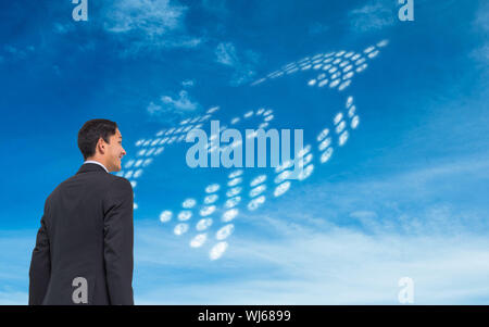 Composite image of smiling asian businessman Stock Photo