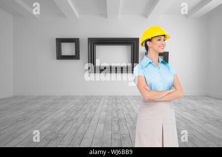 Composite image of smiling attractive architect posing Stock Photo