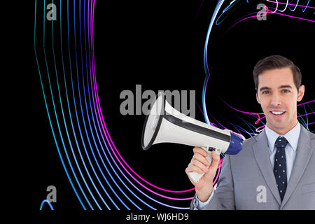 Composite image of smiling businessman holding a megaphone Stock Photo