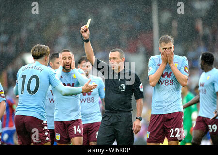 Jack Grealish of Aston Villa gets a yellow card from referee Kevin Friend during the Premier League match between Crystal Palace and Aston Villa at Selhurst Park , London , 31 August 2019  Editorial use only. No merchandising. For Football images FA and Premier League restrictions apply inc. no internet/mobile usage without FAPL license - for details contact Football Dataco