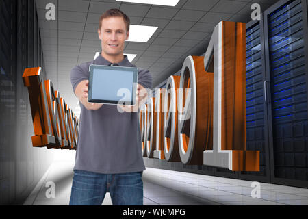Composite image of young man showing screen of his tablet computer against a white background Stock Photo