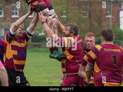 People participating in playing rugby, Clitheroe, Lancashire. Stock Photo