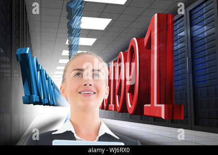 Composite image of blonde businesswoman holding tablet Stock Photo