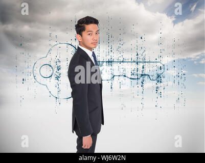 Composite image of serious businessman looking at camera Stock Photo